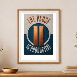 May include: A framed wall art print featuring a dark blue circle on a light background with two vertical copper-colored bars in the center. The text reads THE PAUSE in copper at the top and IS PRODUCTIVE in white at the bottom.