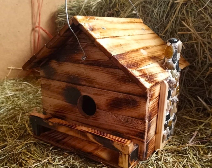 Rustic wooden birdhouse with stone chimney and hitching rail made to order
