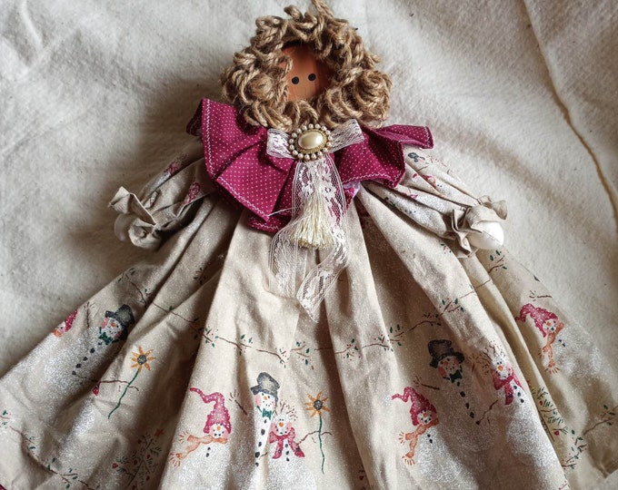 Rustic/primitive wooden block shelf sitting doll with Christmas dress and twine hair
