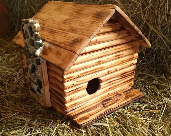 Rustic country log style reclaimed wood birdhouse with stone chimney