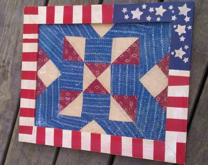 Framed vintage quilt block