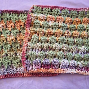 Handcrocheted multi colored square spike stitch potholder set