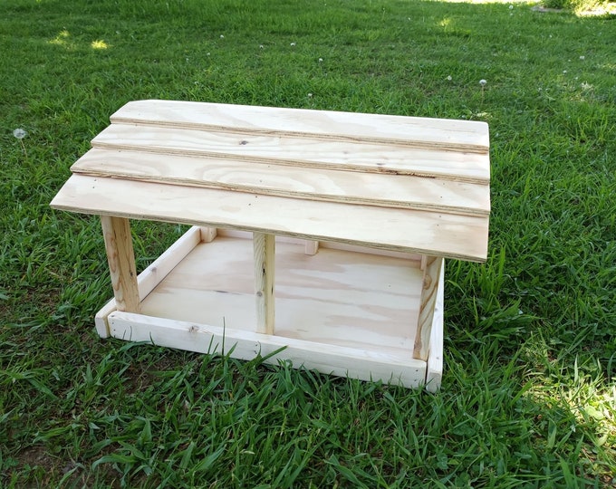 Unfinished reclaimed wood pavilion feeder