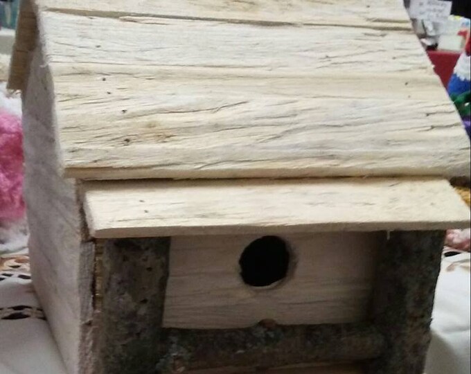 Rustic reclaimed wood birdhouse