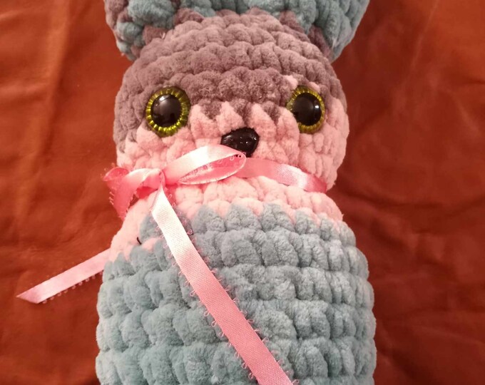 Large Amigurumi crocheted bunny in chunky yarn with pink bow
