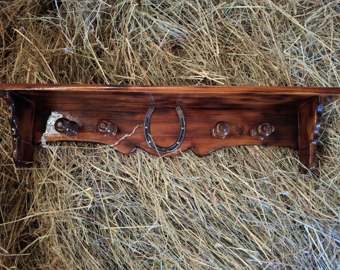 Handcrafted wooden bridle/hat/coat rack with shelf and decorative horseshoe