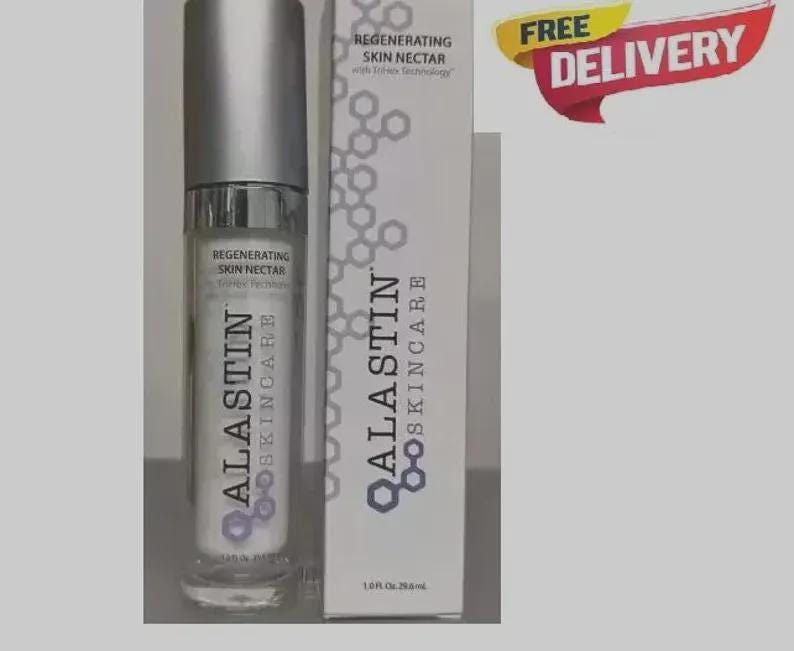 May include: A skincare product bottle and box. The bottle has a silver cap and a clear base, with the text "REGENERATING SKIN NECTAR" and "ALASTIN SKINCARE". The box also displays the brand name and product information.