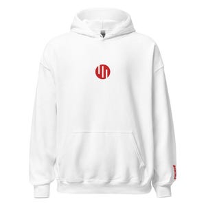 May include: White hooded sweatshirt with a red circular logo on the chest. The sweatshirt has a front pocket and a drawstring hood. The word "INVINCIBLE" is printed vertically in red on the right sleeve. A casual, comfortable garment.