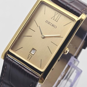 Raro reloj de pulsera Seiko Slim Gold rectangular vintage con esfera chapada en oro.