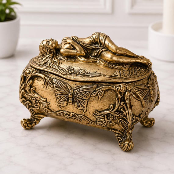 A handcrafted solid brass figural lady trinket box — the kind of heirloom-quality keepsake that looks like it escaped a Victorian curiosity cabinet.