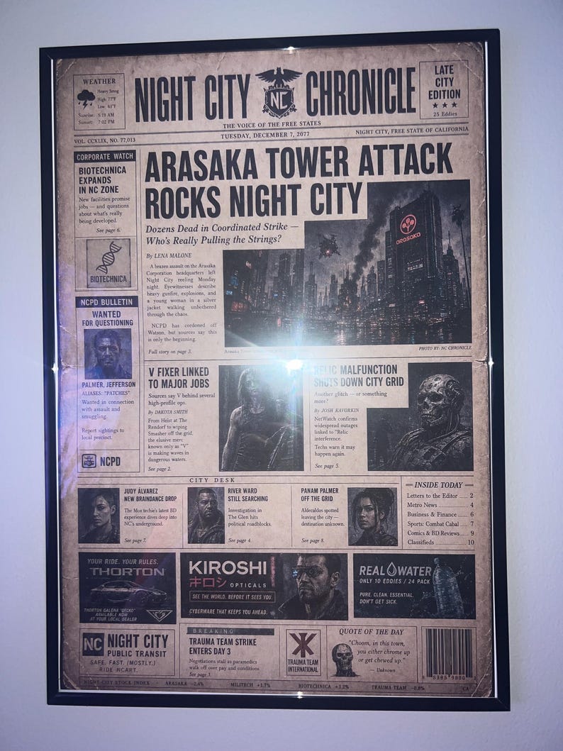 May include: A framed newspaper print titled Night City Chronicle, dated Tuesday, December 7, 2077. The front page features the headline Arasaka Tower Attack Rocks Night City, accompanied by various articles, black and white images, and advertisements.