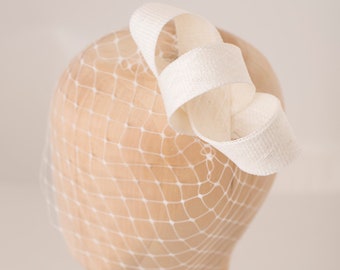 Understated bridal fascinator with veil, Millinery headpiece and birdcage