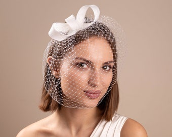 Understated bridal fascinator with birdcage, White headpiece and birdcage, minimalist wedding fascinator