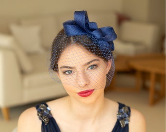 Royal blue fascinator with birdcage veil, blue wedding guest headpiece with veil in various colours