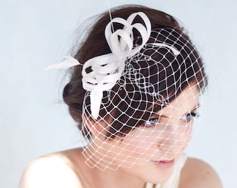 Bridal fascinator with birdcage veil and feathers, wedding millinery headpiece