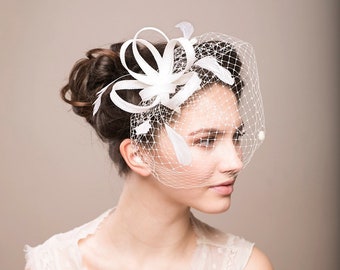 Bridal millinery headpiece with feathers, wedding fascinator with birdcage