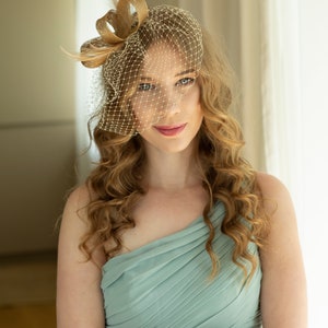 Gold fascinator with beige feathers and birdcage veil, gold wedding guest fascinator, modern millinery headpiece image 5