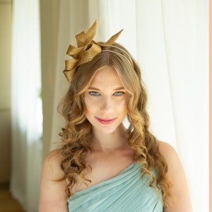 Gold party fascinator on headband, wedding guest fascinator, sculptural woman fascinator, couture millinery headpiece on double headband image 1