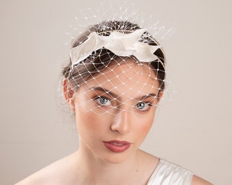 Bridal silk satin leaves and petite birdcage veil on headband in cream colour