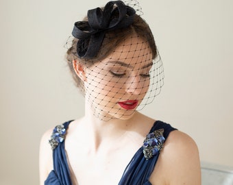 Modern black fascinator with birdcage veil, veiled fascinator in black, wedding guest headpiece in various colours