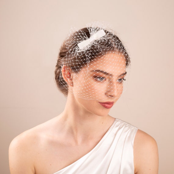 White bridal birdcage veil with pouf and bow, wedding pouf and bow birdcage veil on a hair comb
