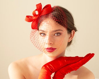 Poppy red fascinator with birdcage veil, red wedding guest headpiece with veil in various colours