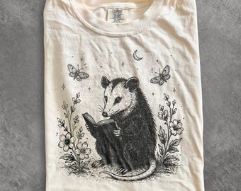 Vintage Reading Opossum Graphic Tee, Cute Book Lover Woodland Animal Shirt, Cozy Nature Aesthetic Top, Comfort Colors® Reader Gift Tee
