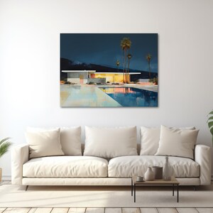 a living room with a couch and a painting on the wall