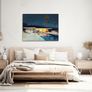 a bedroom with a bed and a painting on the wall
