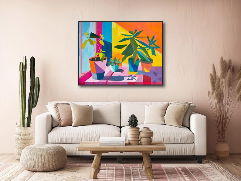 a living room with a white couch and a painting on the wall
