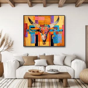 a living room with a couch and a painting on the wall