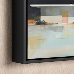a painting hanging on the wall of a house