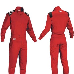 May include: A red racing suit with long sleeves and legs. The suit has black accents on the shoulders and collar, and the brand name "OMP" is visible. The suit is shown from the front and back.