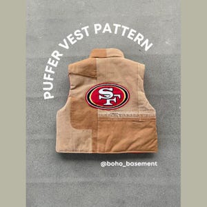 May include: A tan and brown puffer vest with a San Francisco 49ers logo patch. The words "PUFFER VEST PATTERN" are arched above the vest. The Instagram handle @boho_basement is at the bottom.
