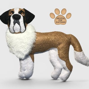 May include: A stuffed Saint Bernard dog with brown and white fur, black ears, and a white fluffy collar. The dog has a black nose and is standing on all fours. A paw print graphic with the text "DIGITAL PDF PATTERN" is in the upper right corner.