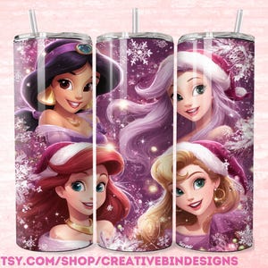 May include: A stainless steel tumbler featuring four animated princesses in Santa hats, set against a purple and snowflake background. The princesses are Jasmine, Ariel, Elsa, and Aurora. The tumbler has a straw and the text "PNG" and "ETSY.COM/SHOP/CREATIVEBINDESIGNS".