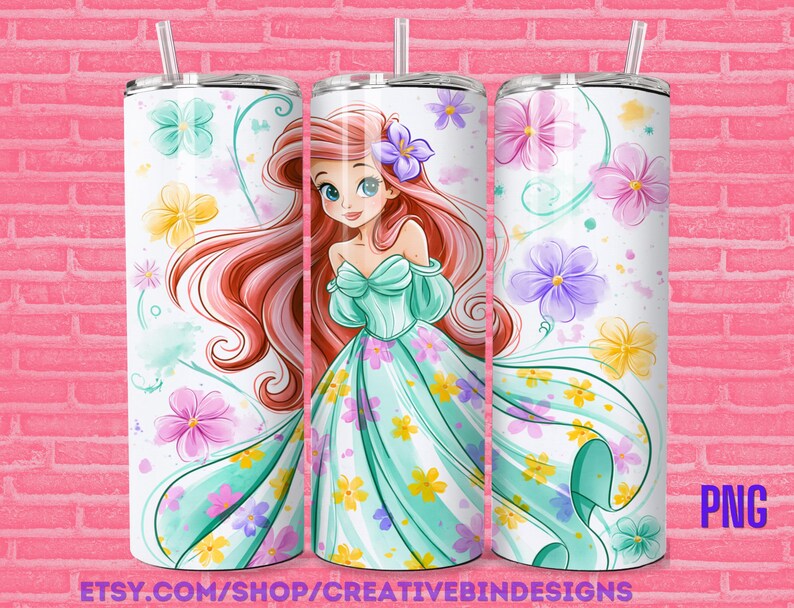 May include: Three cylindrical tumblers with straws featuring a cartoon character with long red hair and a teal off-the-shoulder dress. The design includes a white background with scattered watercolor-style flowers in pink, yellow, purple, and teal.