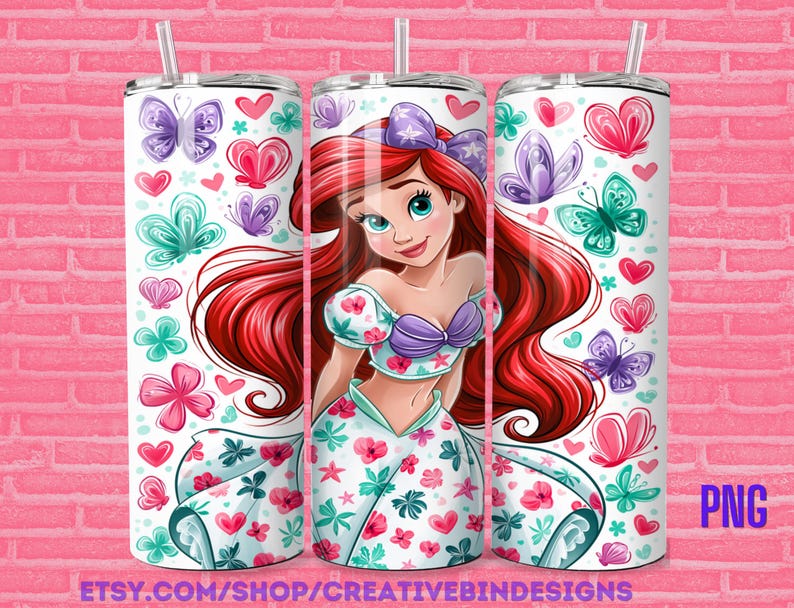 May include: A cylindrical tumbler featuring a cartoon character with long red hair, a purple shell top, and a white skirt with floral patterns. The design includes colorful butterflies and hearts in shades of pink, purple, and teal against a white background.