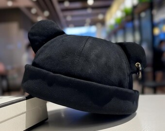 Zwarte katoenen dockerhoed met berenoren | Gerolde manchet met ring