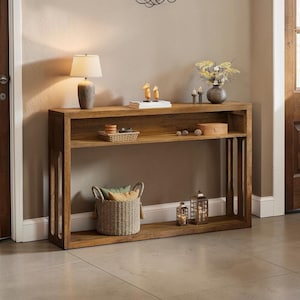 May include: A set of three ceramic mugs with a speckled, matte finish. The mugs are in shades of cream, light gray, and dark gray. Each mug has a simple, minimalist design, perfect for coffee or tea.