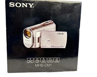 new sony MHS-CM1 purple webbie handycam video recorder. HD snap camera