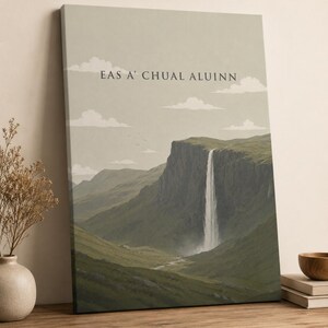 May include: A rectangular canvas print featuring a landscape illustration of a waterfall cascading down a green cliffside. The sky is a muted beige with white clouds and the text EAS A' CHUAL ALUINN is printed in dark grey near the top centre.