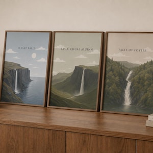 May include: Three framed wall art prints featuring landscape illustrations of waterfalls. The left print shows Mealt Falls, the centre print shows Eas A' Chual Aluinn, and the right print shows Falls of Foyers, each with its name printed in white text.