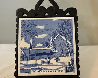 Currier and Ives Cast Iron and Ceramic Trivet