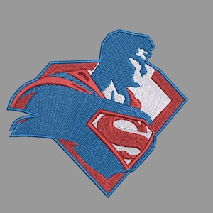 May include: An embroidered patch featuring a blue silhouette of a figure in a cape, layered over a white background with a red border. A prominent red and white letter S emblem is centred within the design, outlined in red thread.