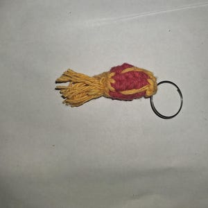 May include: A set of three ceramic nesting bowls in shades of blue, green, and white. The bowls feature a speckled glaze and a simple, modern design. The largest bowl measures approximately 6 inches in diameter.