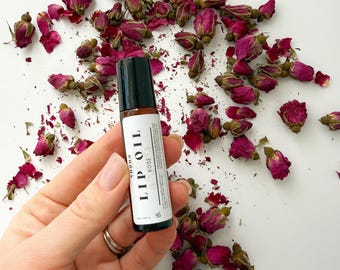 Aceite labial hidratante con aceites de macadamia, jojoba y almendras, y vitamina E.