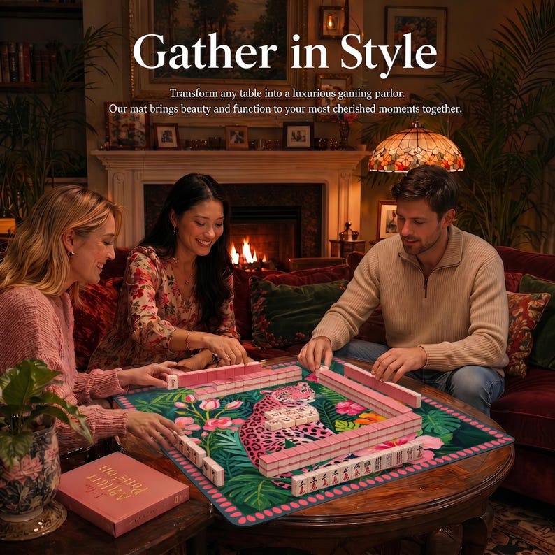 May include: A rectangular game mat featuring a vibrant leopard and tropical floral print in shades of pink, green, and black. The mat is placed on a wooden table with rows of pink and white mahjong tiles arranged in a square formation for gameplay.