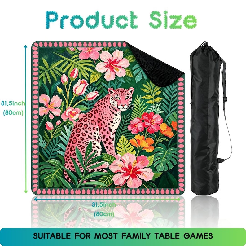 May include: A square game mat featuring a pink leopard surrounded by tropical flowers and green foliage, with a pink teardrop border. It measures 31.5 inches by 31.5 inches and includes a black drawstring carrying bag for storage and transport.