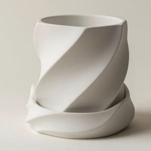 May include: A white ceramic planter with a distinctive, twisted design. The planter has a spiral pattern and sits on a matching saucer. The minimalist design is suitable for small plants or succulents.